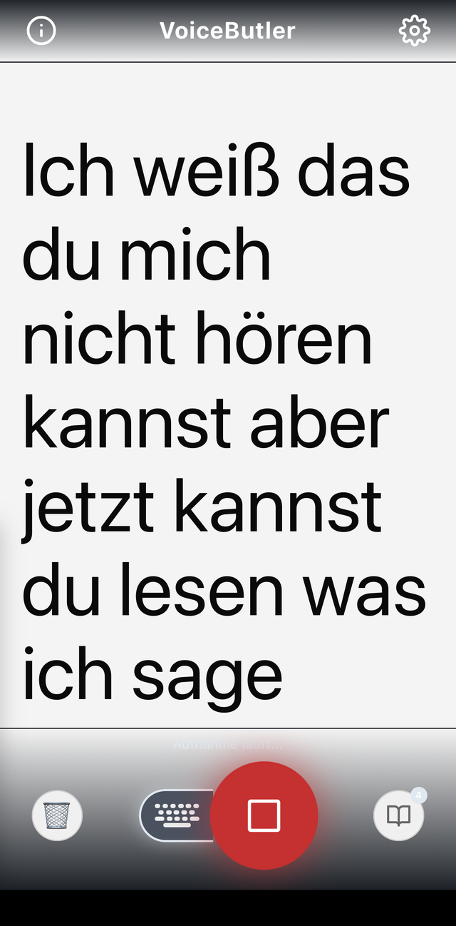 VoiceButler auf dem iPhone: Während der Aufnahme erscheint der gesprochene Satz „Ich weiß das du mich nicht hören kannst aber jetzt kannst du lesen was ich sage“ in großer Schrift. Darunter die Bedienleiste mit Papierkorb, Schreibtafel, Stopp-Taste und Sitzungsarchiv.